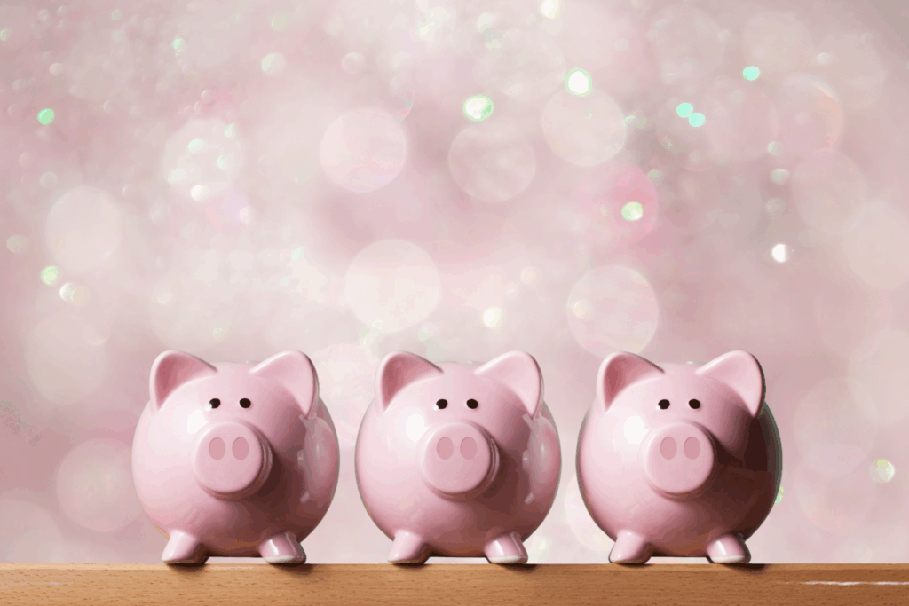 Drei rosa Sparschweine